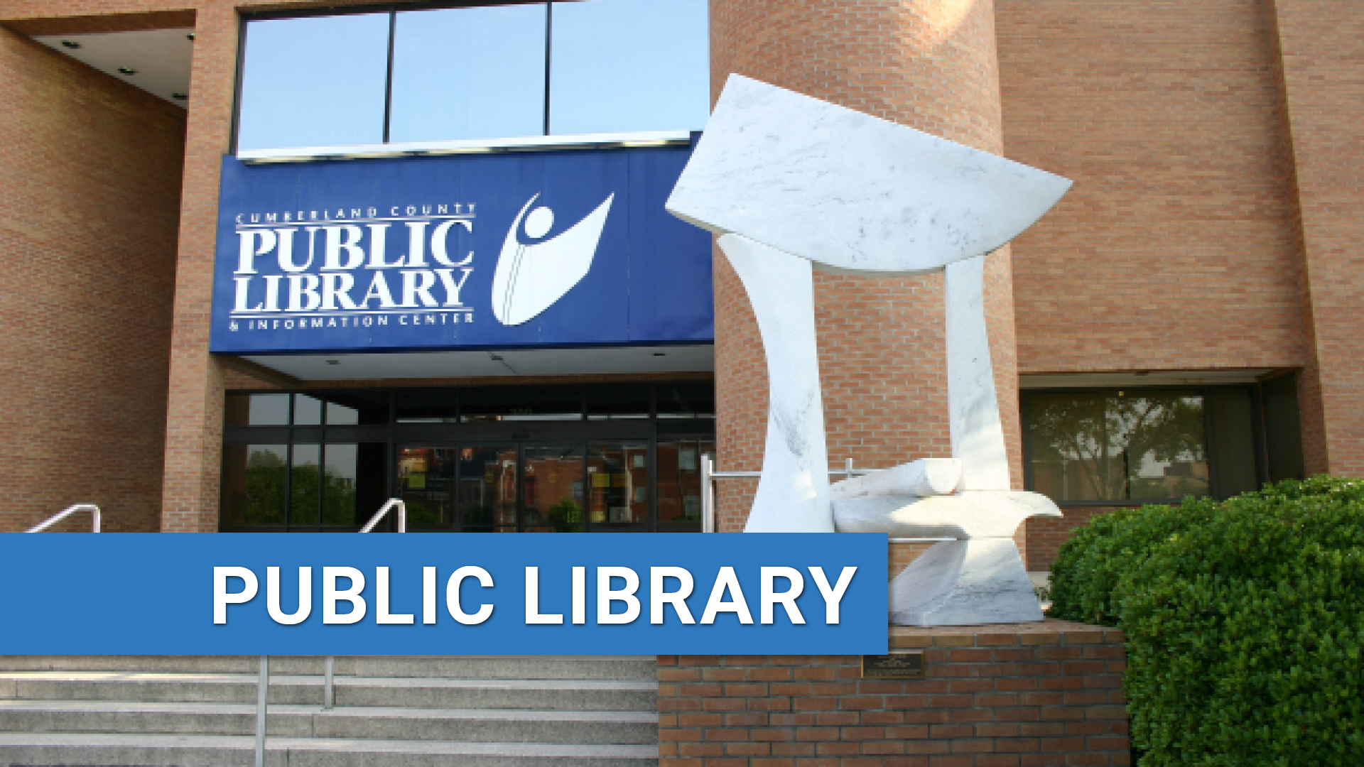 Exterior of headquarters library with text: Public Library.