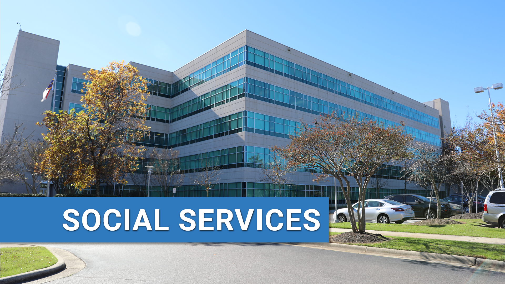 Exterior of Social Services building with text: Social Services.