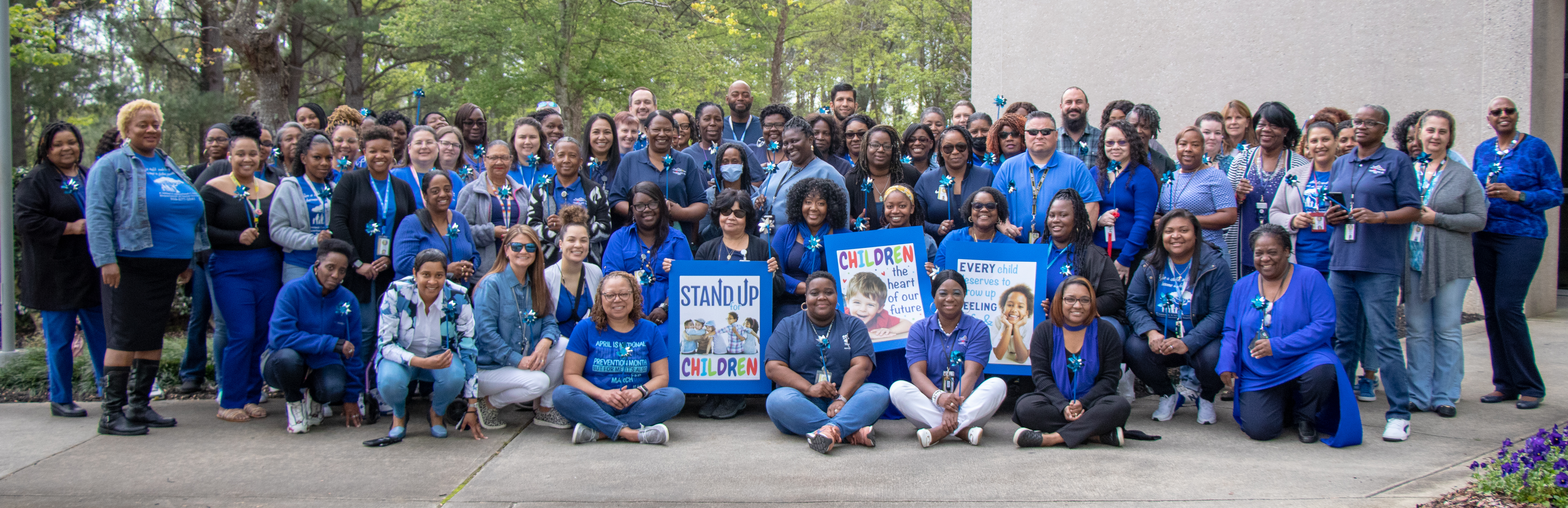 group of people wearing blue